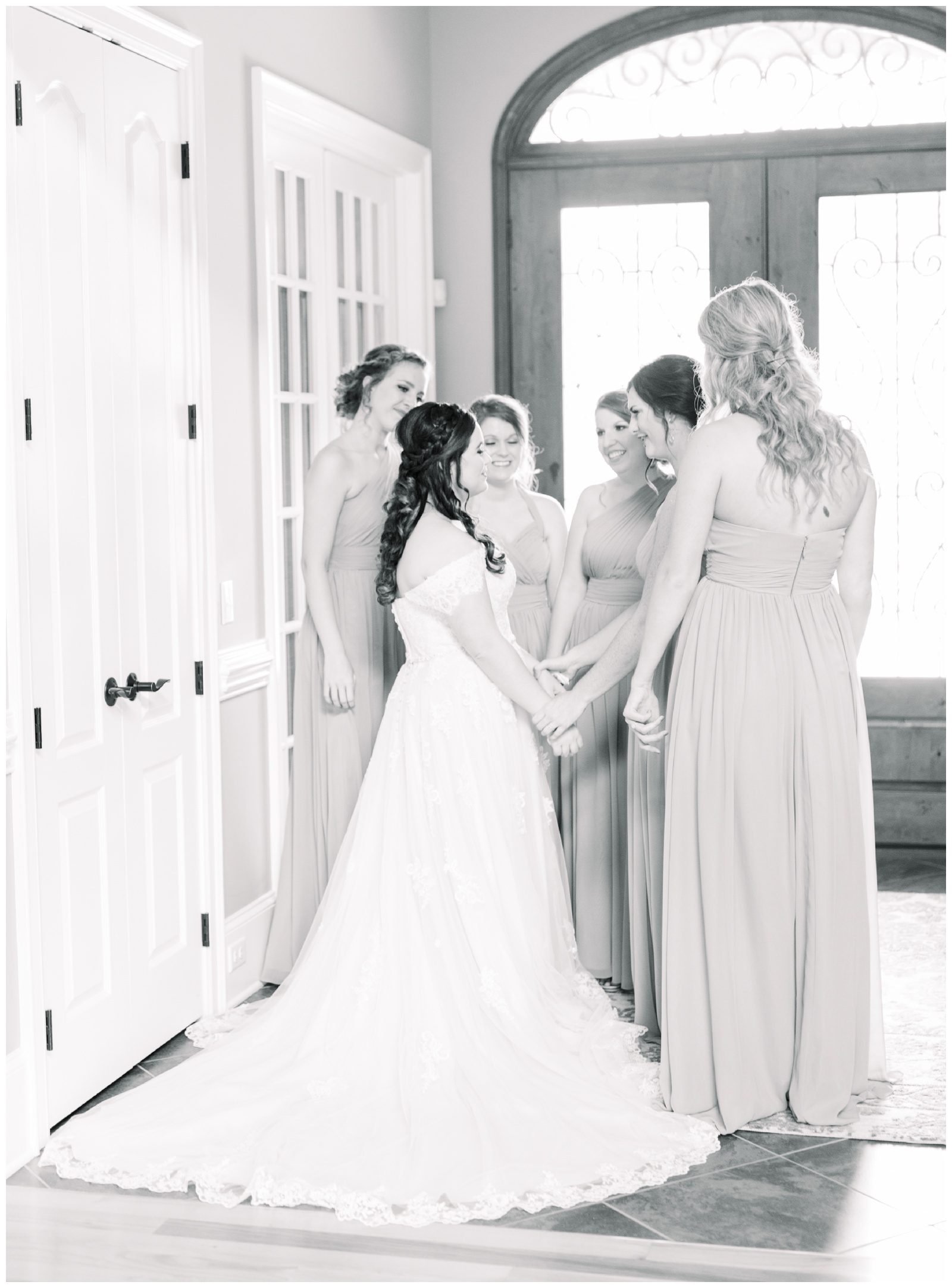 bridesmaids and bride holding hands, atlanta ga wedding photographer