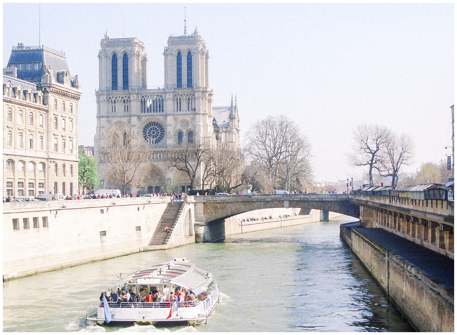 view of Notre Dame Cathedral, the Seine, boat, Paris, France